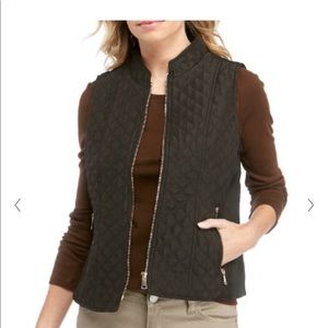 Black vest with gold zippers